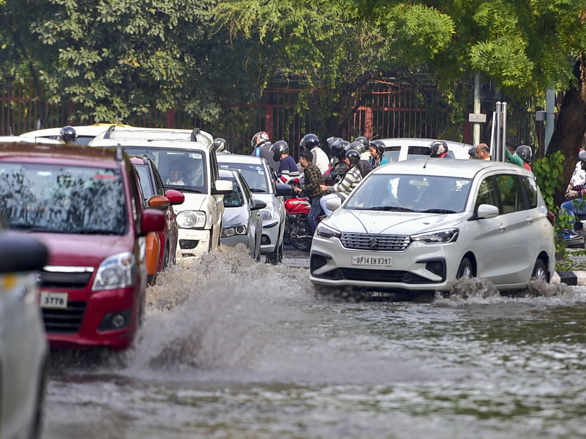 Heavy rains lash Delhi Photo Gallery - Sakshi7