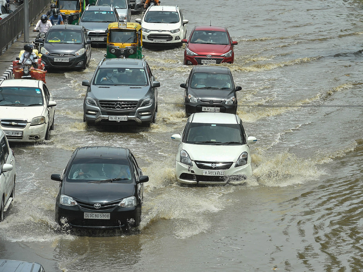  Heavy rains lash Delhi Photo Gallery - Sakshi13