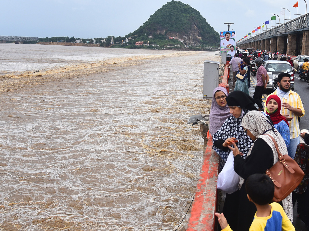 heavy water inflow krishna rivers vijayawada  - Sakshi15