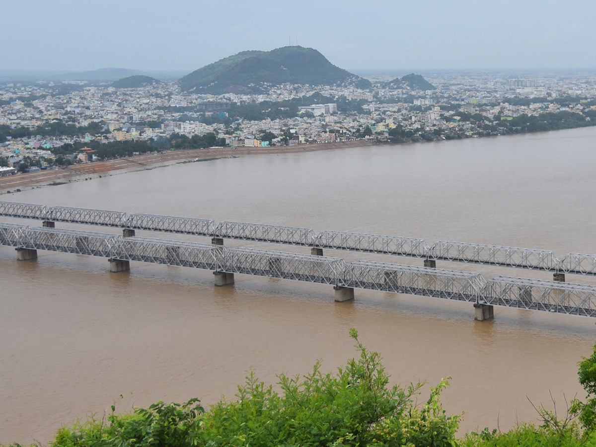 heavy water inflow krishna rivers vijayawada  - Sakshi20