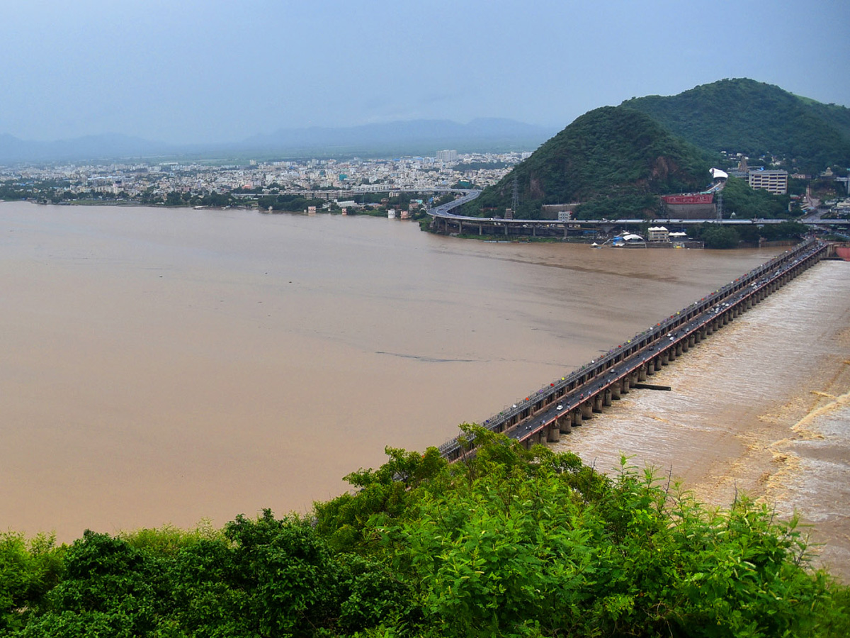 heavy water inflow krishna rivers vijayawada  - Sakshi24