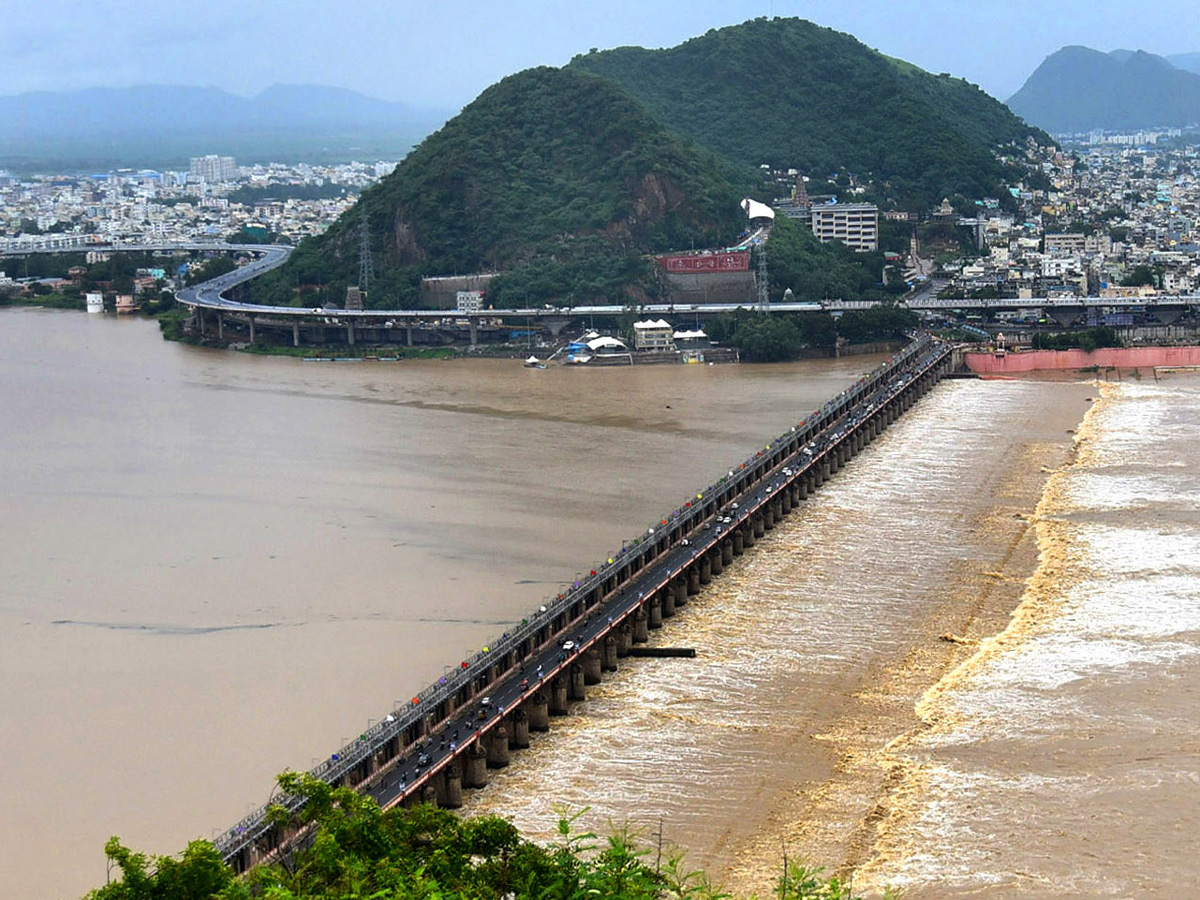 heavy water inflow krishna rivers vijayawada  - Sakshi26