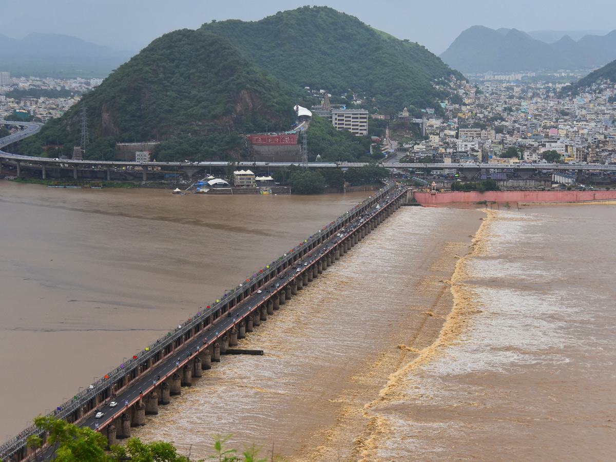 heavy water inflow krishna rivers vijayawada  - Sakshi6