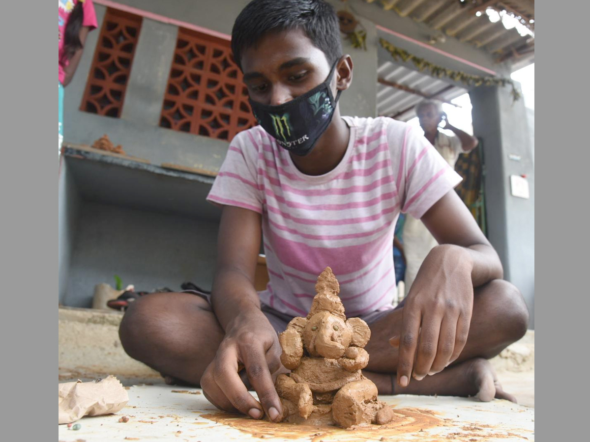 Childrens Making Clay Ganesha While Watching Sakshi TV Photo Gallery - Sakshi6