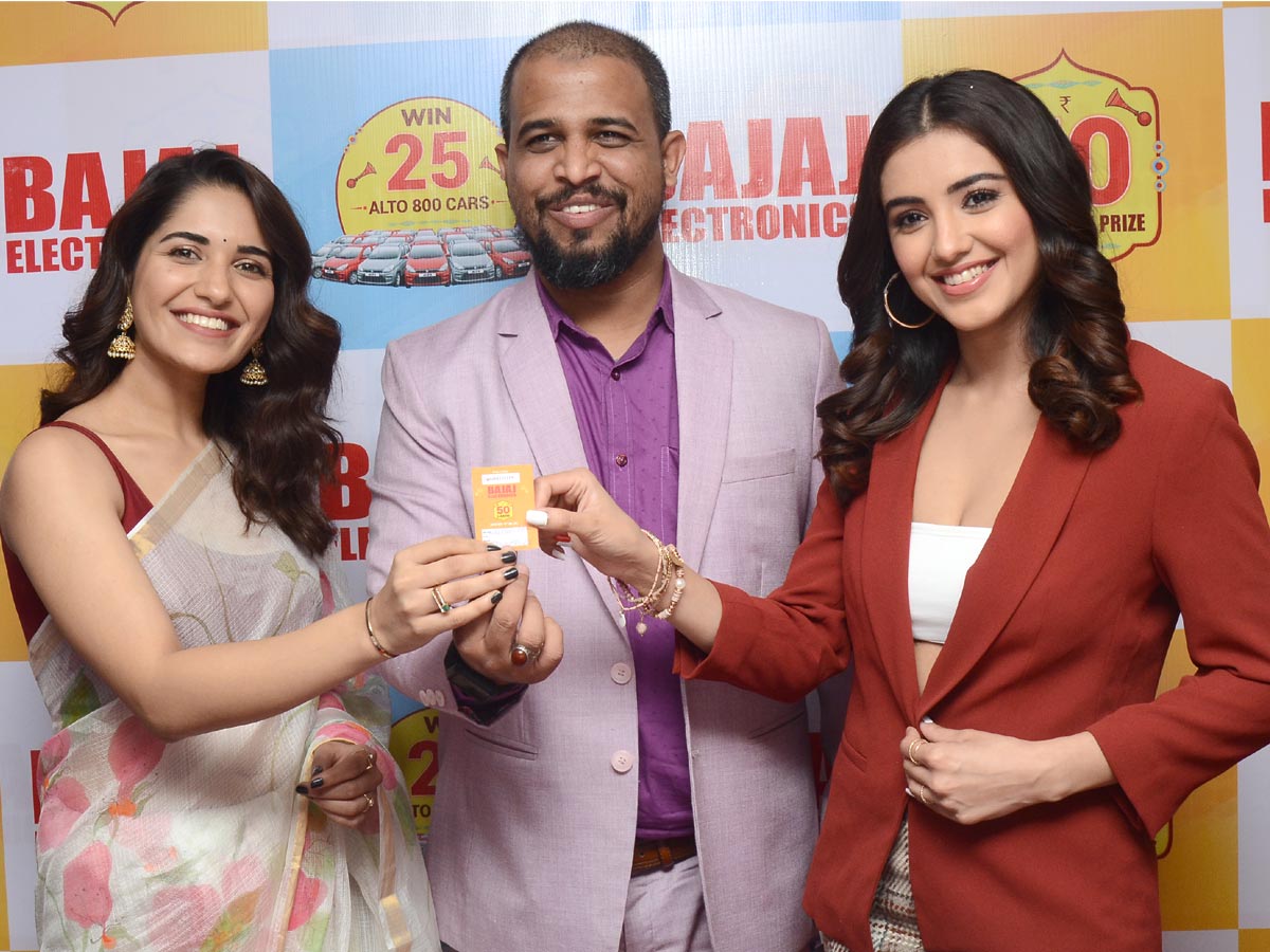 Movie stars Malavika Sharma, Ruhani Sharma and Simrat Kaur made a splash at the Bajaj Electronics Electronics Festival in Panjagutta on Tuesday. - Sakshi1