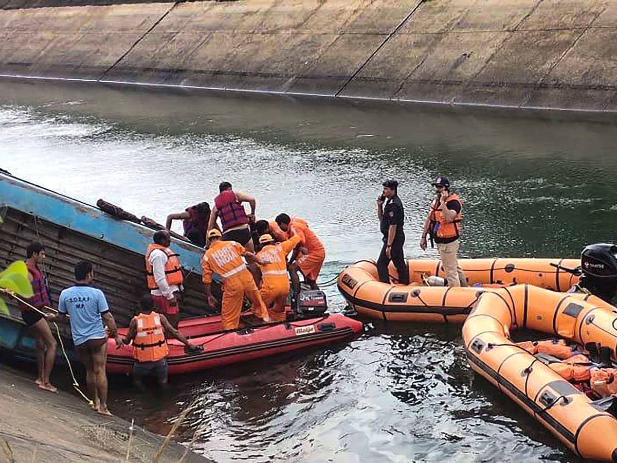 Bus Falls Into Canal 54 Passengers Onboard Madhya Pradesh Photos - Sakshi9