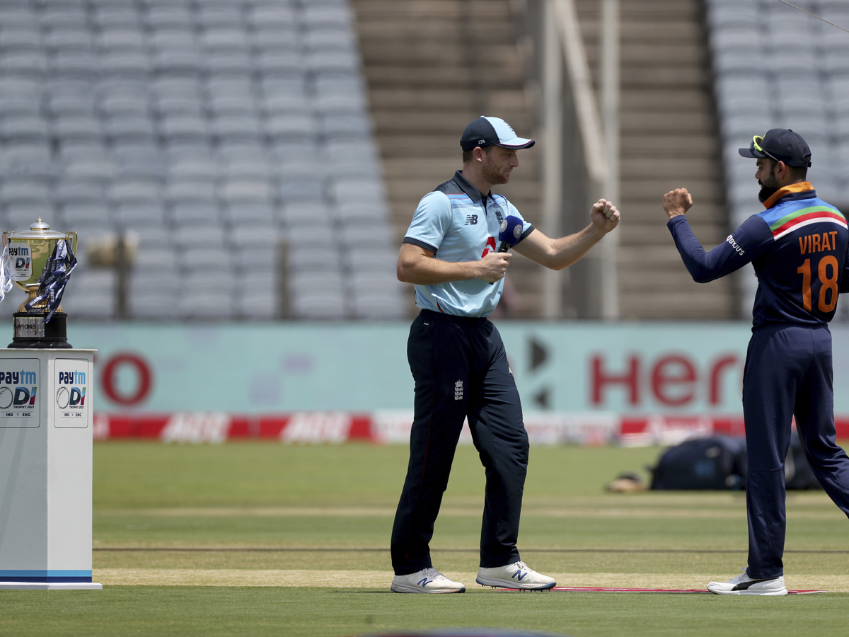 India edges out England by 7 runs to win series Photo Gallery - Sakshi40