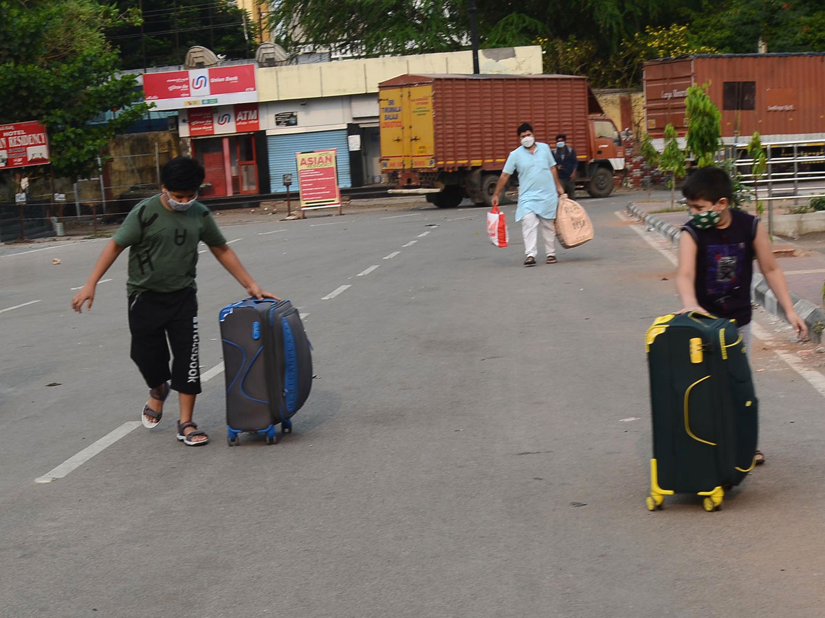 People moving to their own villages for fear of curfew Photo Gallery - Sakshi3