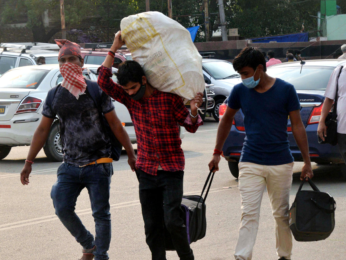 People moving to their own villages for fear of curfew Photo Gallery - Sakshi11