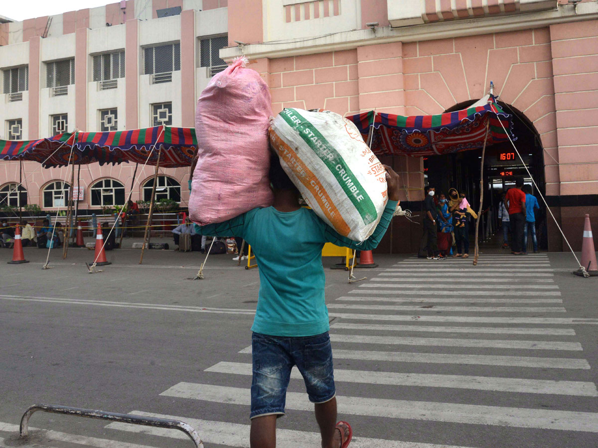 People moving to their own villages for fear of curfew Photo Gallery - Sakshi12