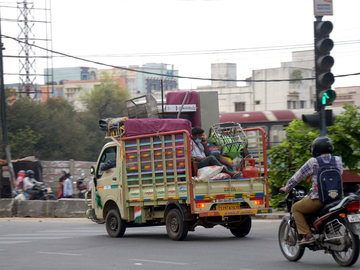 People moving to their own villages for fear of curfew Photo Gallery - Sakshi30