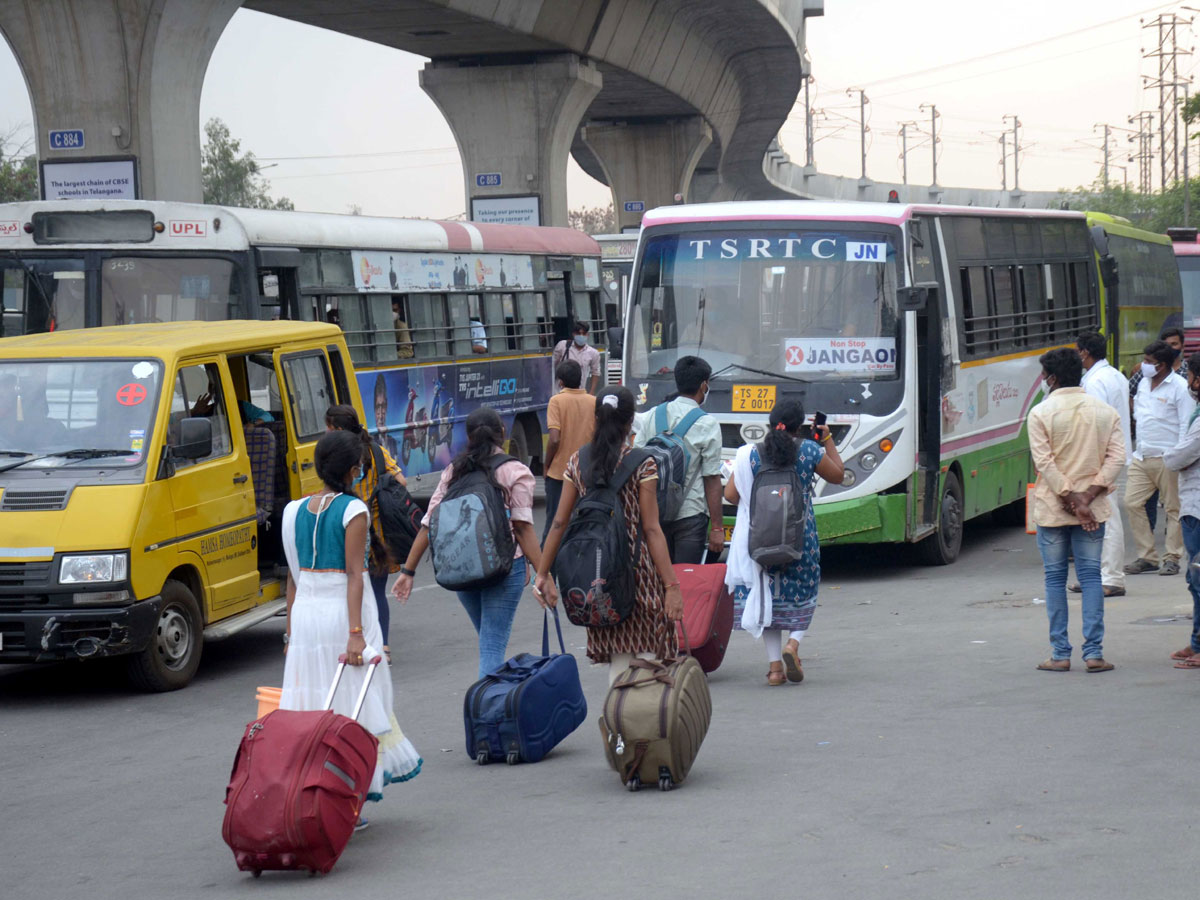 People moving to their own villages for fear of curfew Photo Gallery - Sakshi5