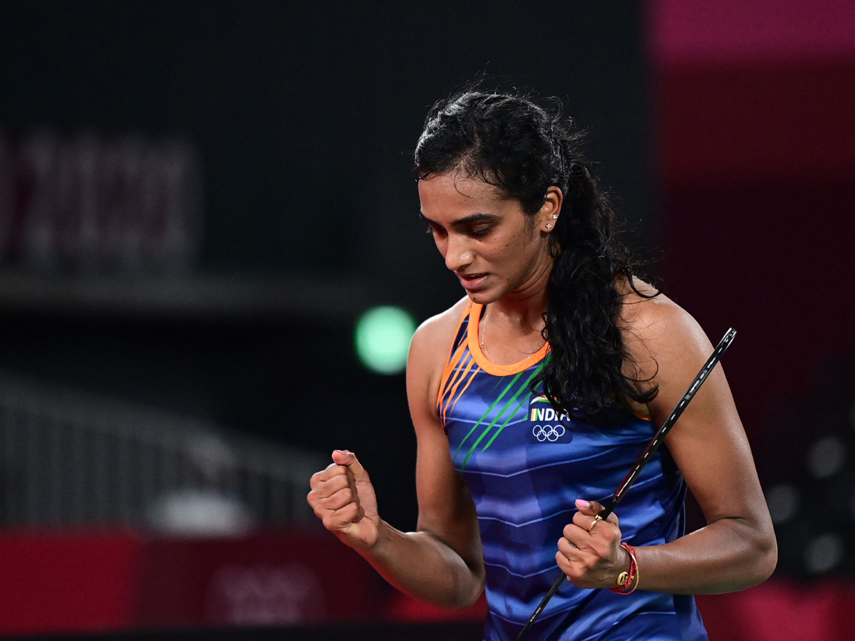 PV Sindhu becomes first Indian shuttler to reach two Olympic semis Photo Gallery - Sakshi2