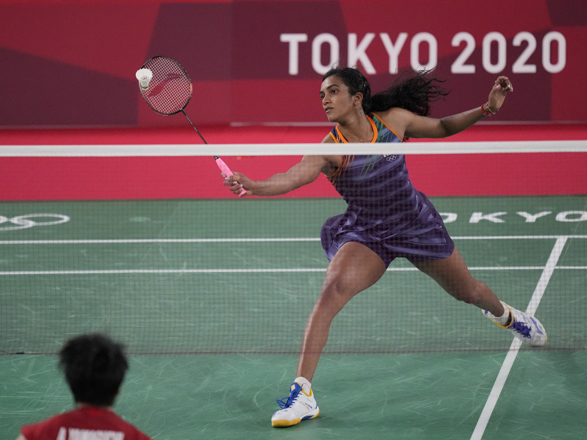 PV Sindhu becomes first Indian shuttler to reach two Olympic semis Photo Gallery - Sakshi5