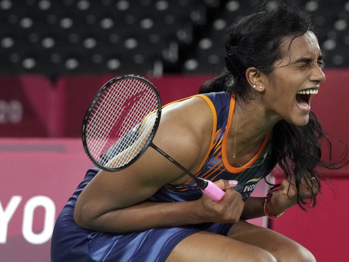 PV Sindhu becomes first Indian shuttler to reach two Olympic semis Photo Gallery - Sakshi7