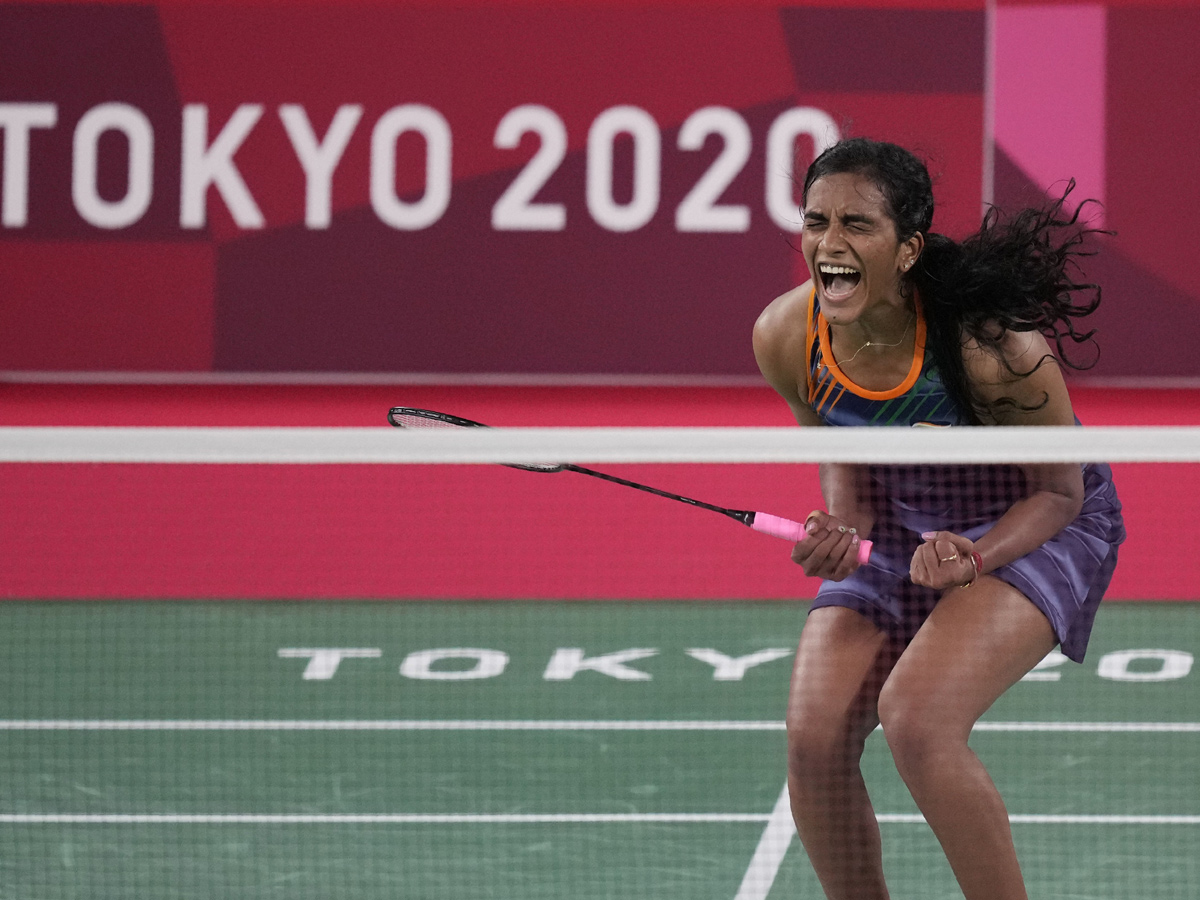 PV Sindhu becomes first Indian shuttler to reach two Olympic semis Photo Gallery - Sakshi8