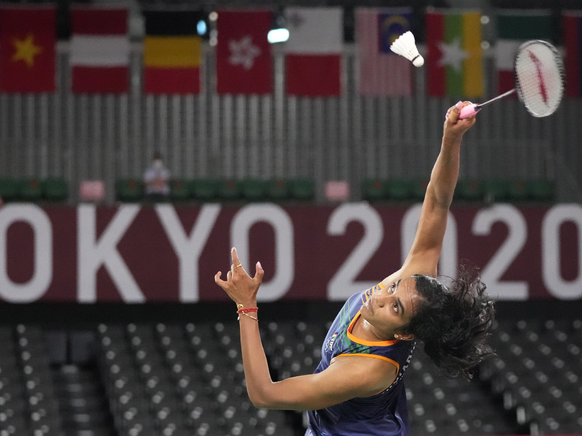 PV Sindhu becomes first Indian shuttler to reach two Olympic semis Photo Gallery - Sakshi10