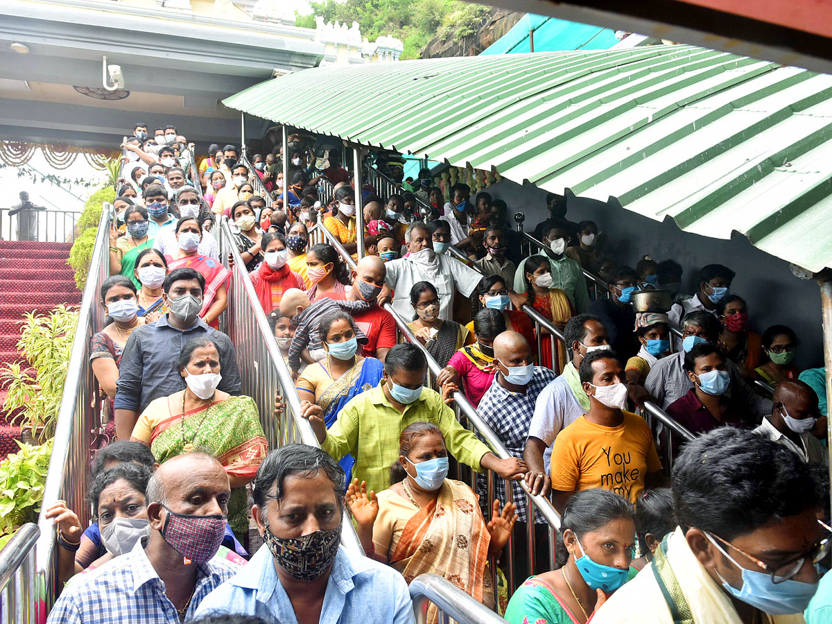 Devotees Rush On The Occasion Of Sravana Masam in Indrakeeladri - Sakshi10