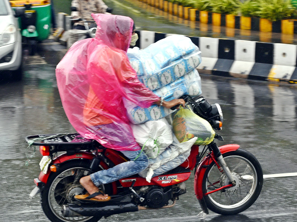 Heavy Rain in Telugu States Photo Gallery - Sakshi24