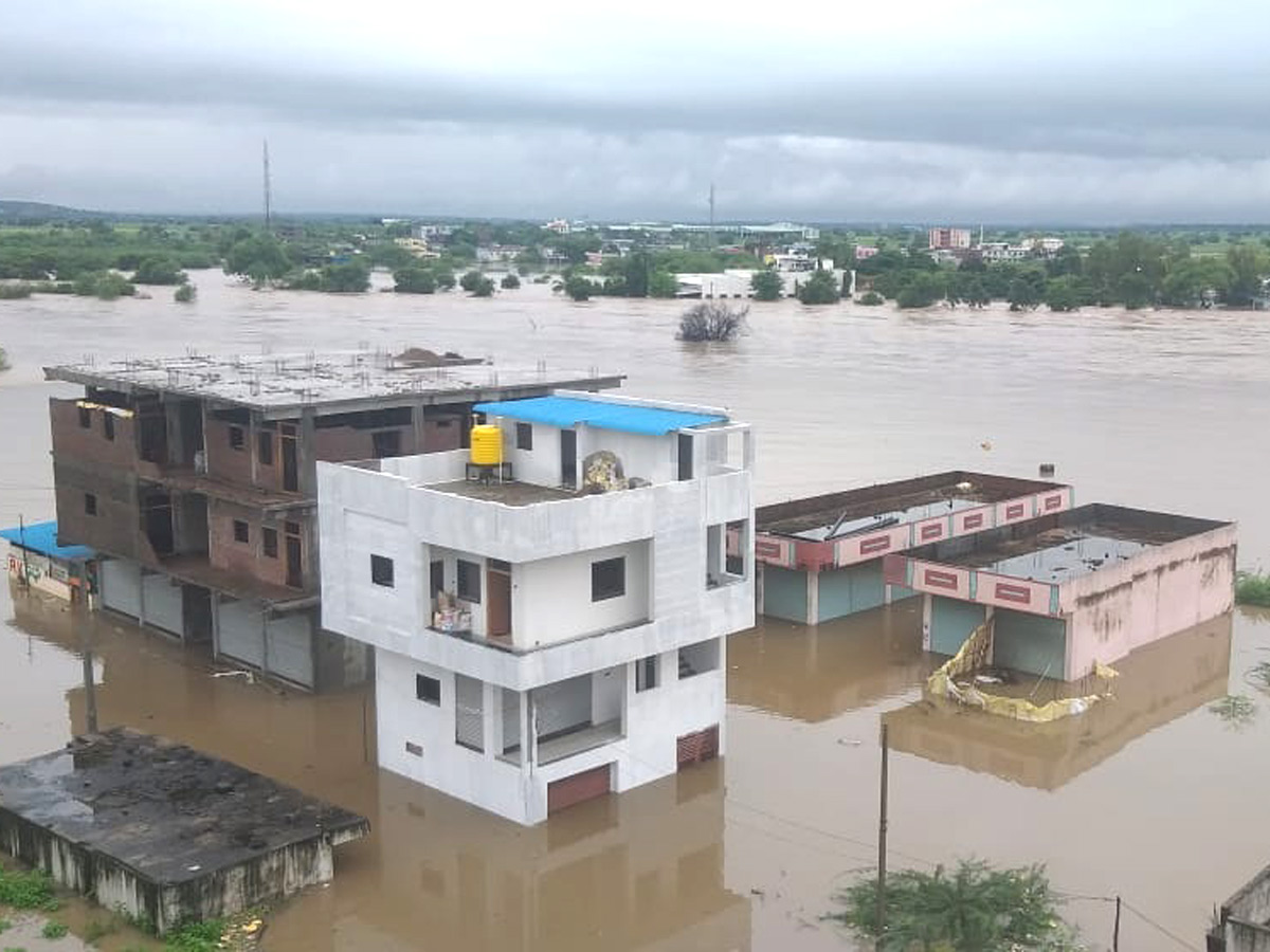 Heavy rains in Karimnagar Sircilla districts - Sakshi11