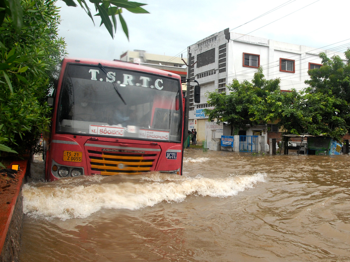 Heavy rains in Karimnagar Sircilla districts - Sakshi4