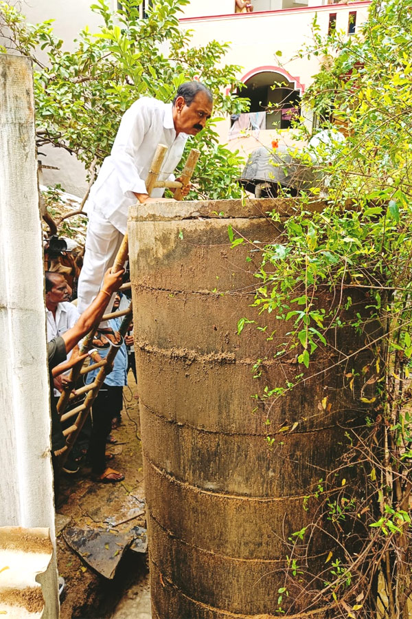 Tirupati: Water Tank Came Up From Ground To Road Photo Gallery - Sakshi12