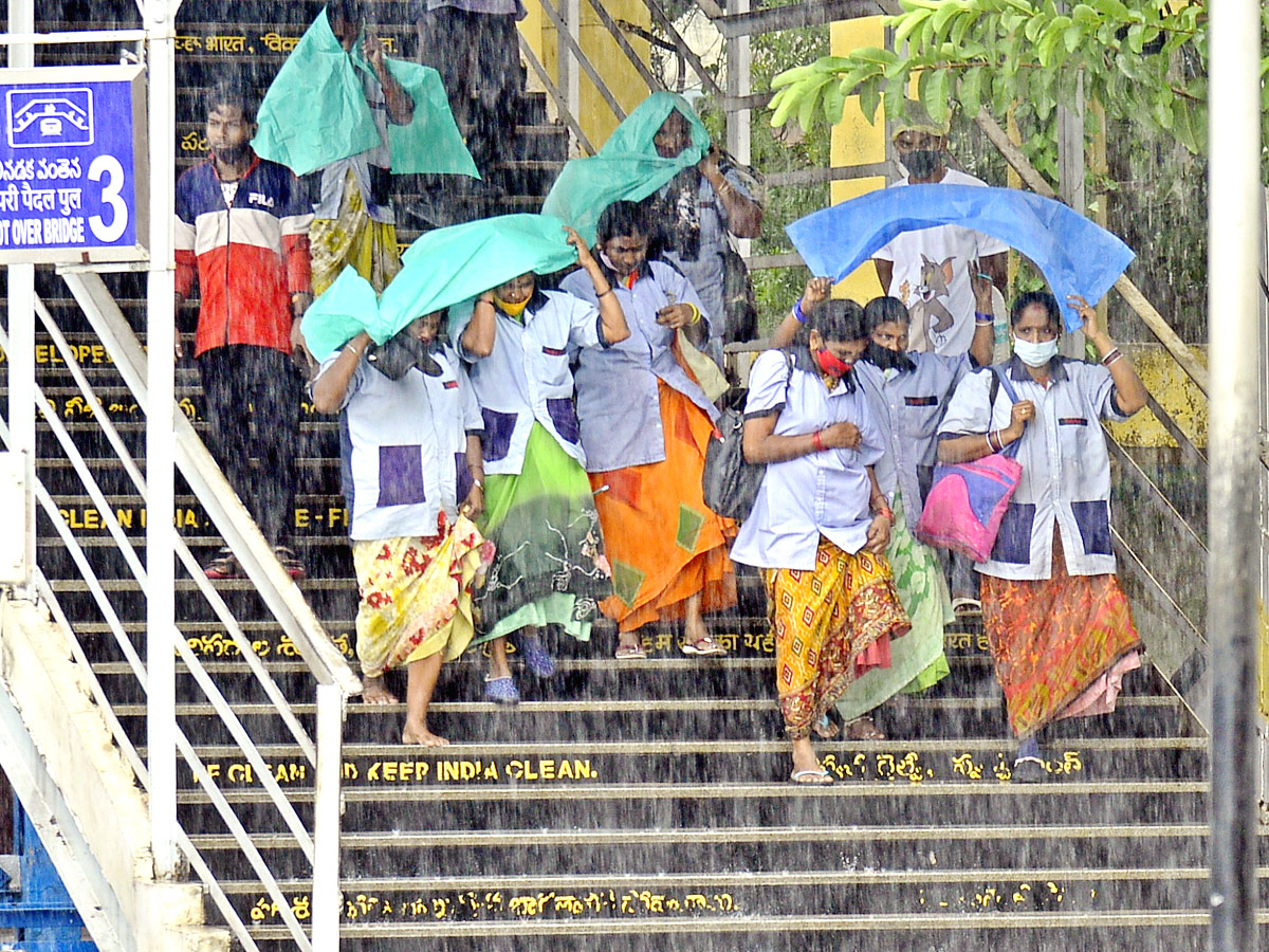 Heavy Rains In Vijayawada Photo Gallery - Sakshi10