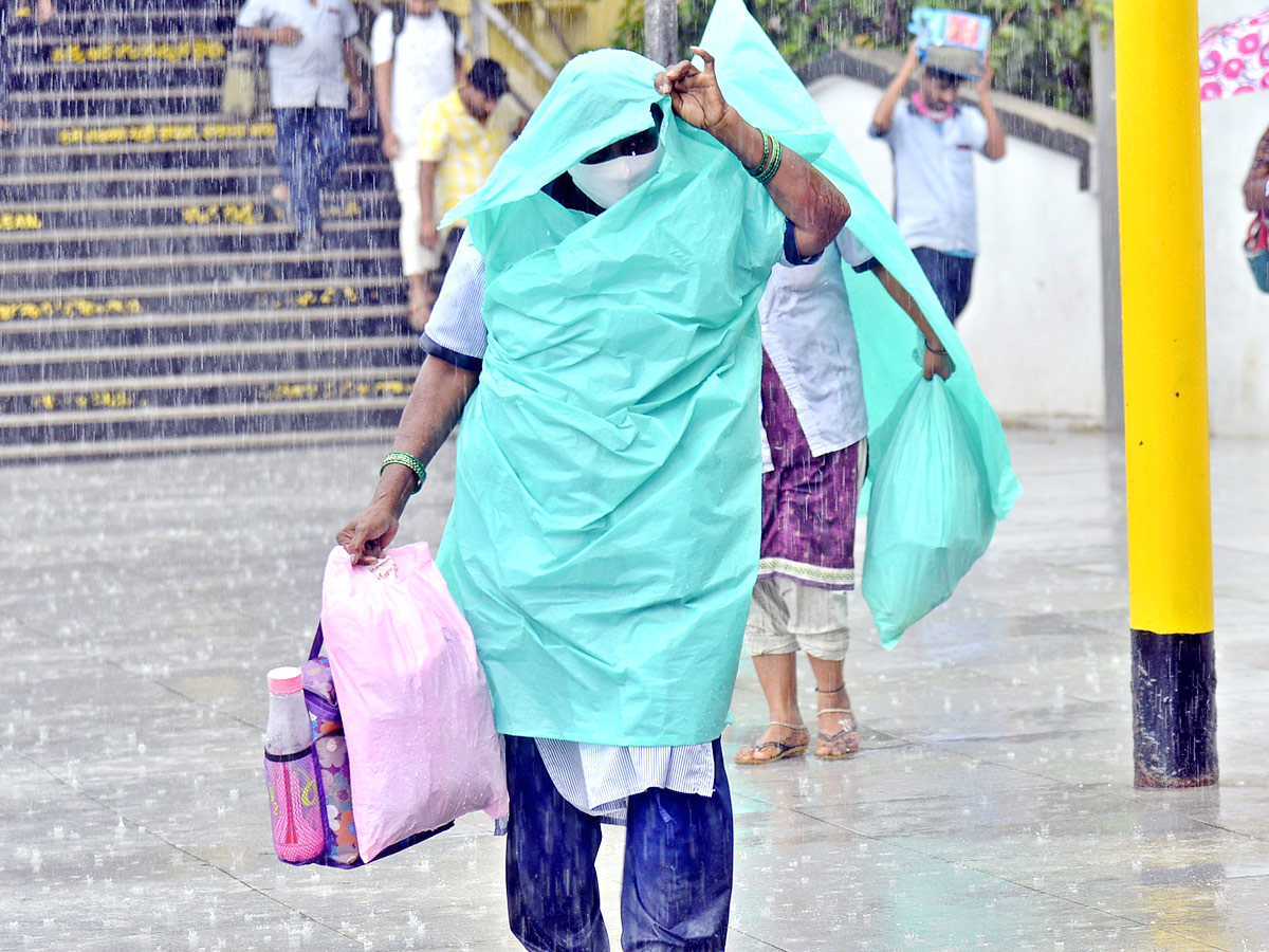 Heavy Rains In Vijayawada Photo Gallery - Sakshi11