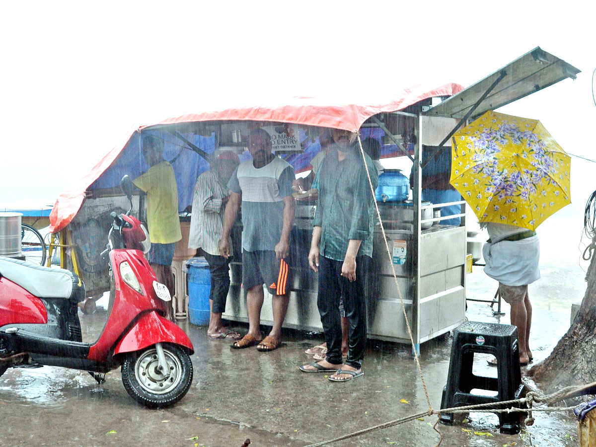 Heavy Rains In Vijayawada Photo Gallery - Sakshi12