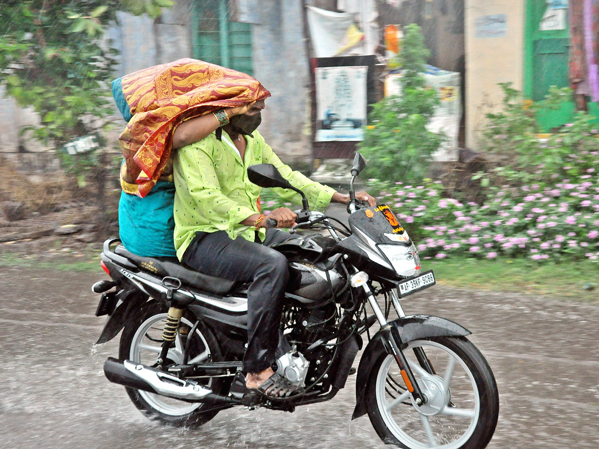 Heavy Rains In Vijayawada Photo Gallery - Sakshi13