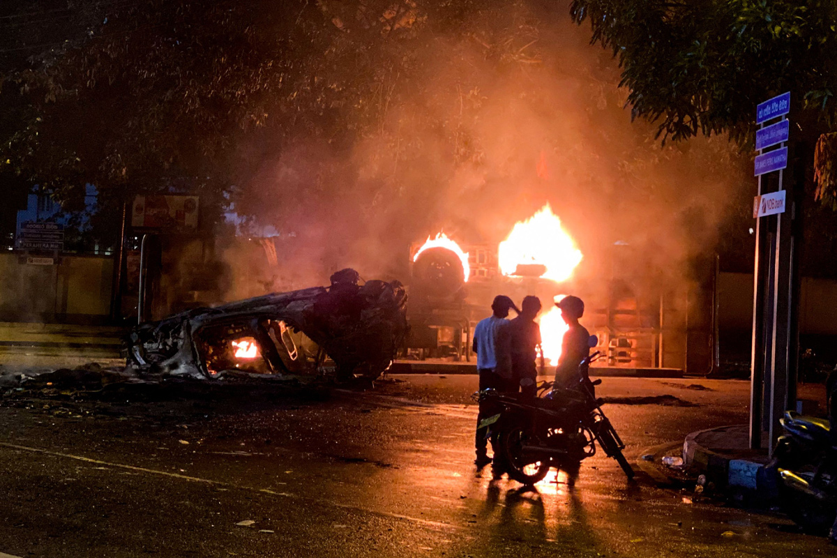 Sri Lanka: Protesters torch leaders' homes in night of unrest - Sakshi18