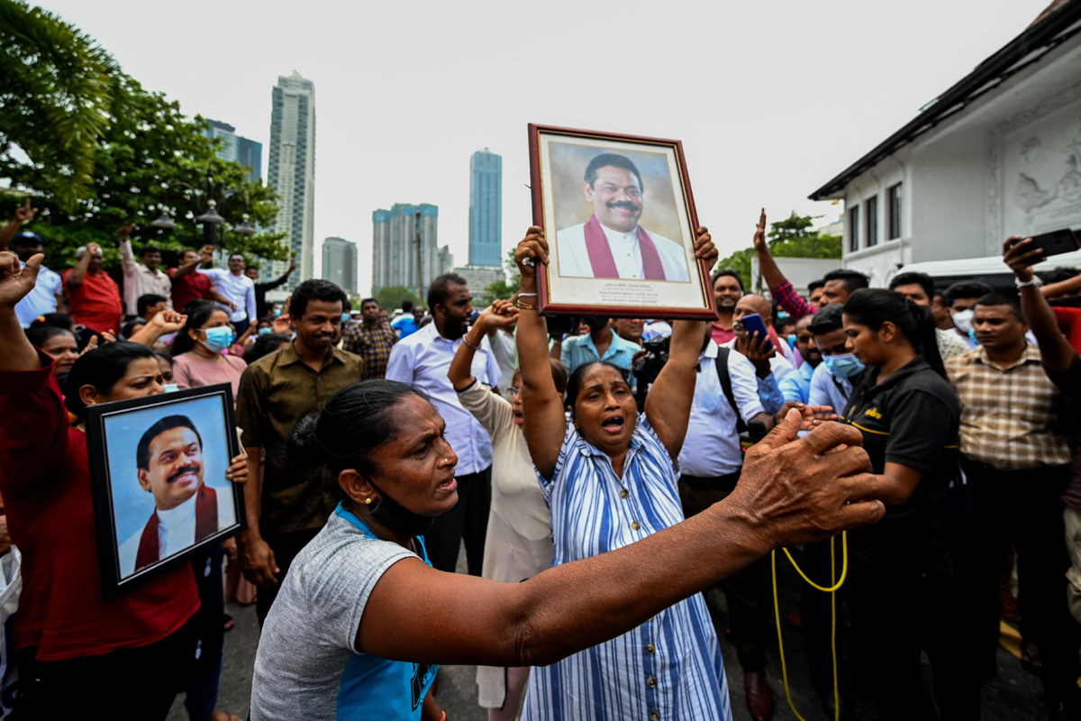 Sri Lanka: Protesters torch leaders' homes in night of unrest - Sakshi20