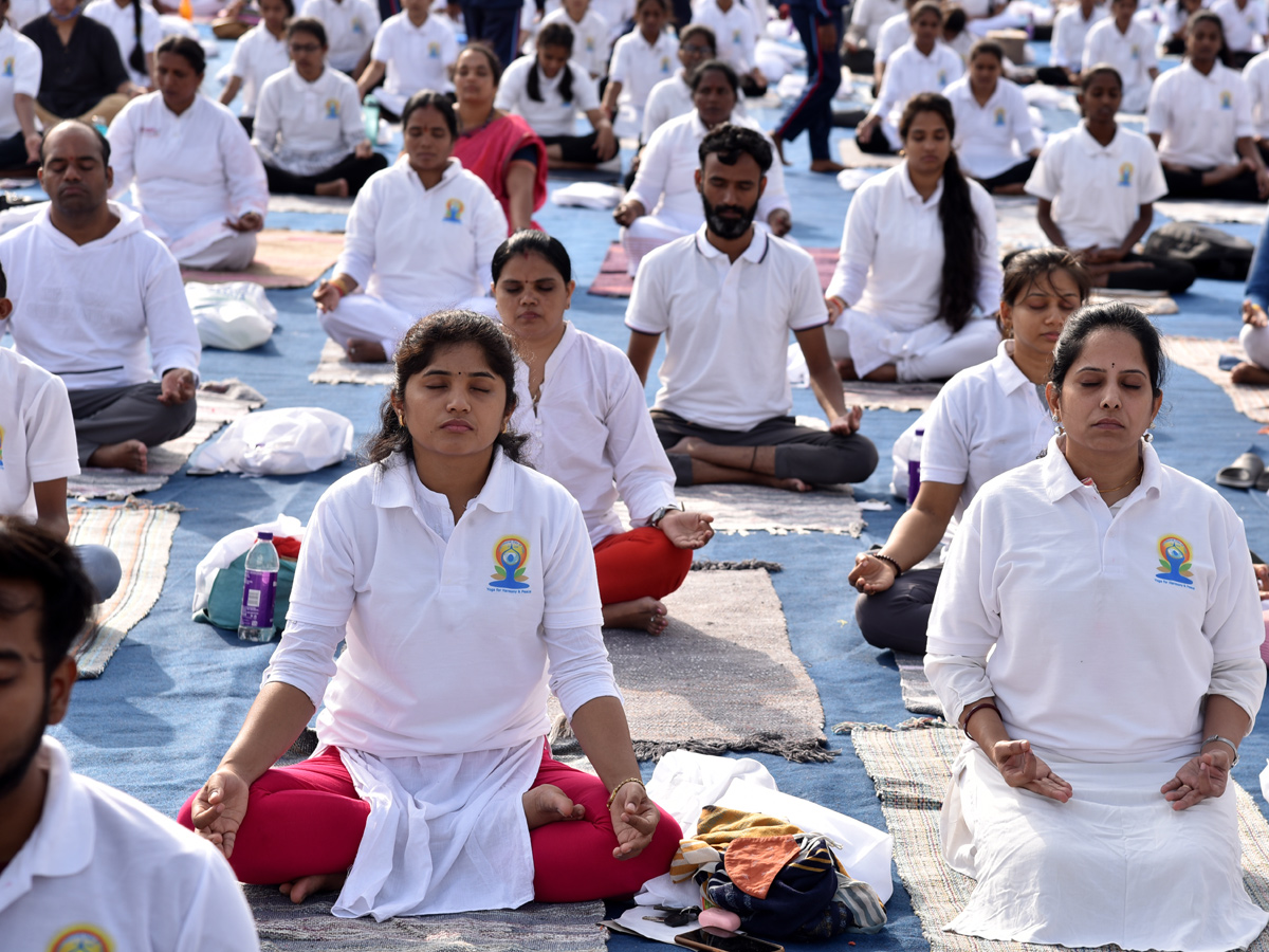 Thousands Participate In Yoga Utsav At Hyderabad LB Stadium Photo Gallery - Sakshi5
