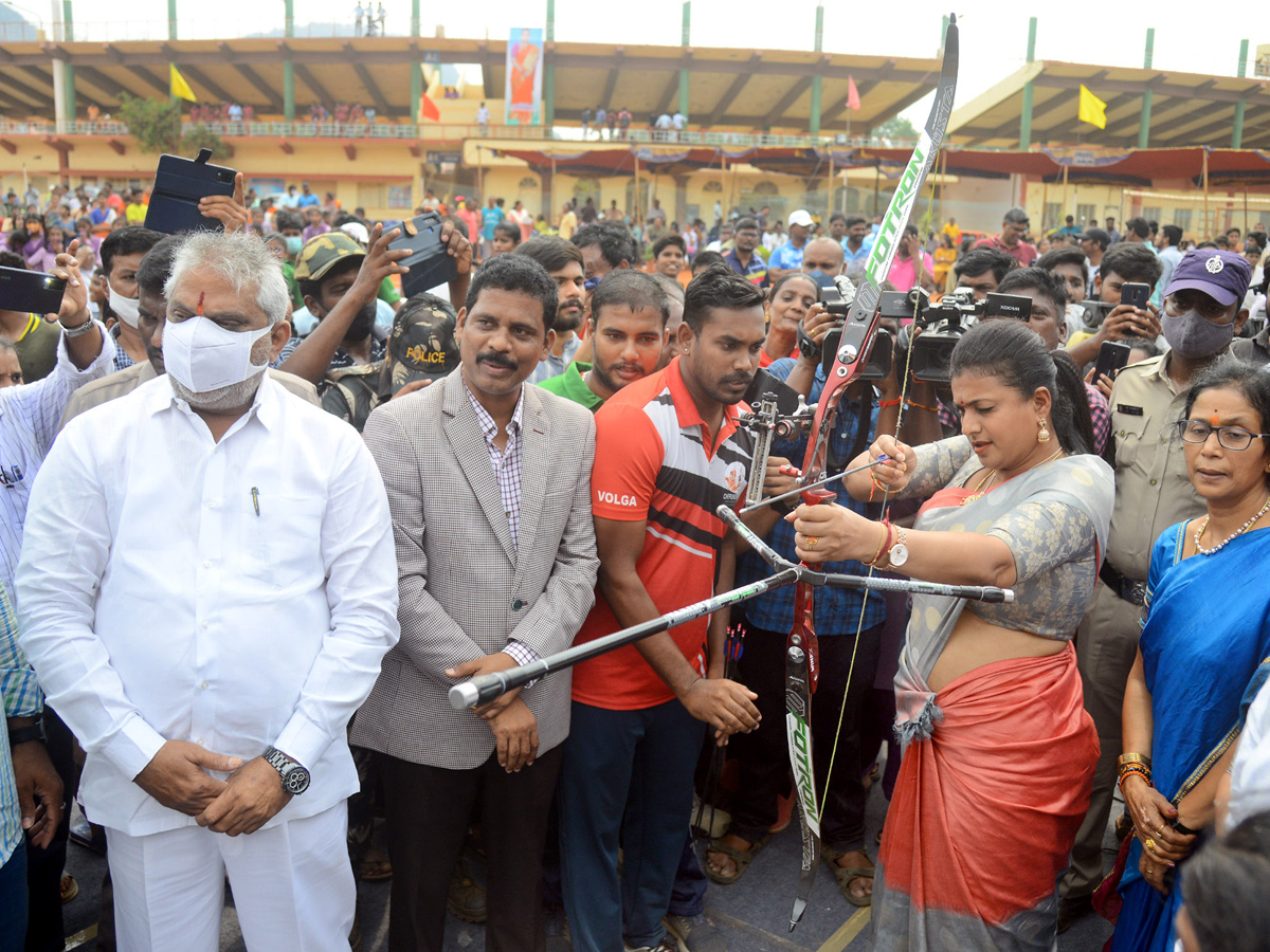 Minister Roja Playing Basket Ball Cricket and Archery game In Vijayawada Corporate Ground photo Gallery - Sakshi6