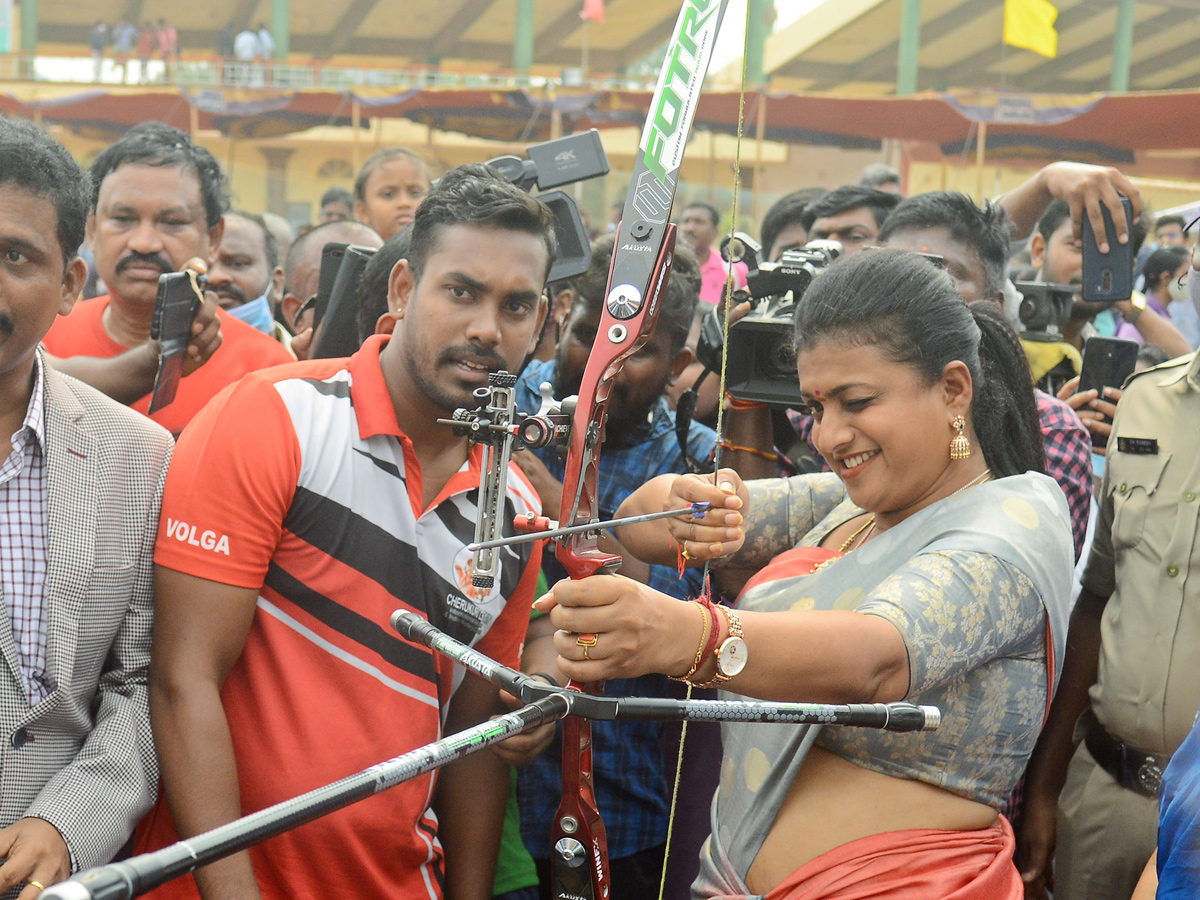 Minister Roja Playing Basket Ball Cricket and Archery game In Vijayawada Corporate Ground photo Gallery - Sakshi7