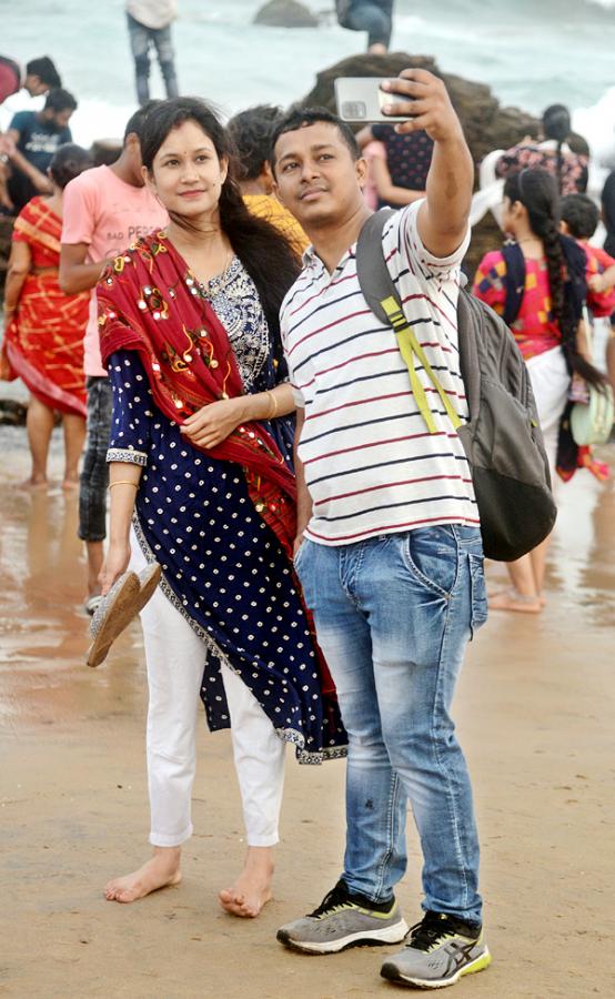 Tourists Rush at Rushikonda Beach Visakhapatnam  - Sakshi11