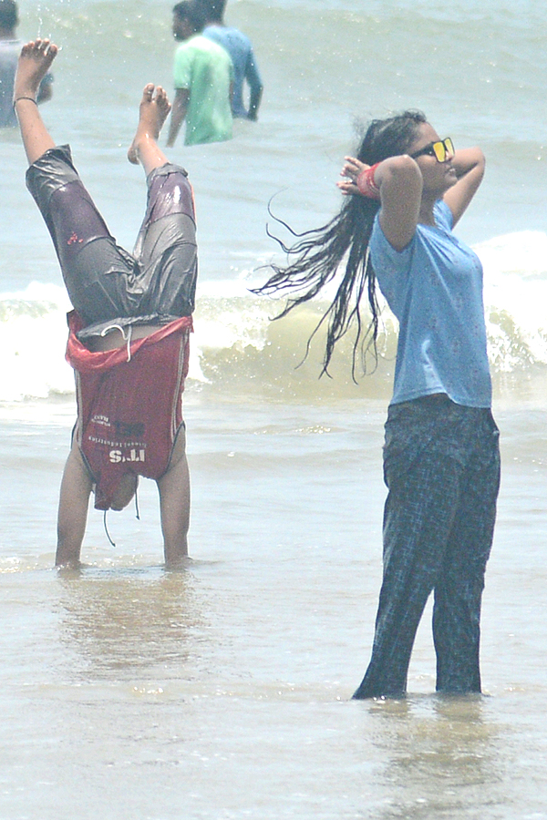 People are Enjoying Sea Bath at Rushikonda Beach Visakhapatnam - Sakshi10