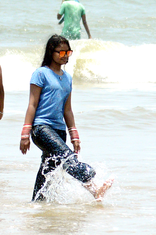 People are Enjoying Sea Bath at Rushikonda Beach Visakhapatnam - Sakshi11