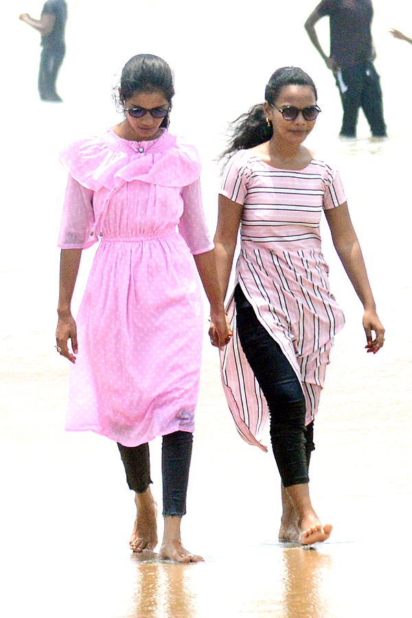 People are Enjoying Sea Bath at Rushikonda Beach Visakhapatnam - Sakshi14