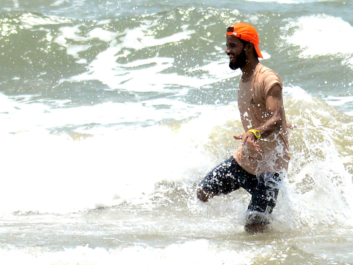 People are Enjoying Sea Bath at Rushikonda Beach Visakhapatnam - Sakshi4