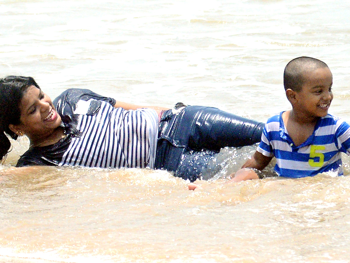 People are Enjoying Sea Bath at Rushikonda Beach Visakhapatnam - Sakshi6