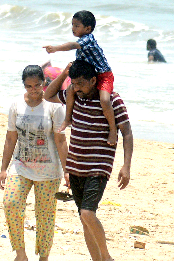 People are Enjoying Sea Bath at Rushikonda Beach Visakhapatnam - Sakshi7