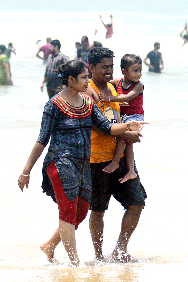 People are Enjoying Sea Bath at Rushikonda Beach Visakhapatnam - Sakshi9