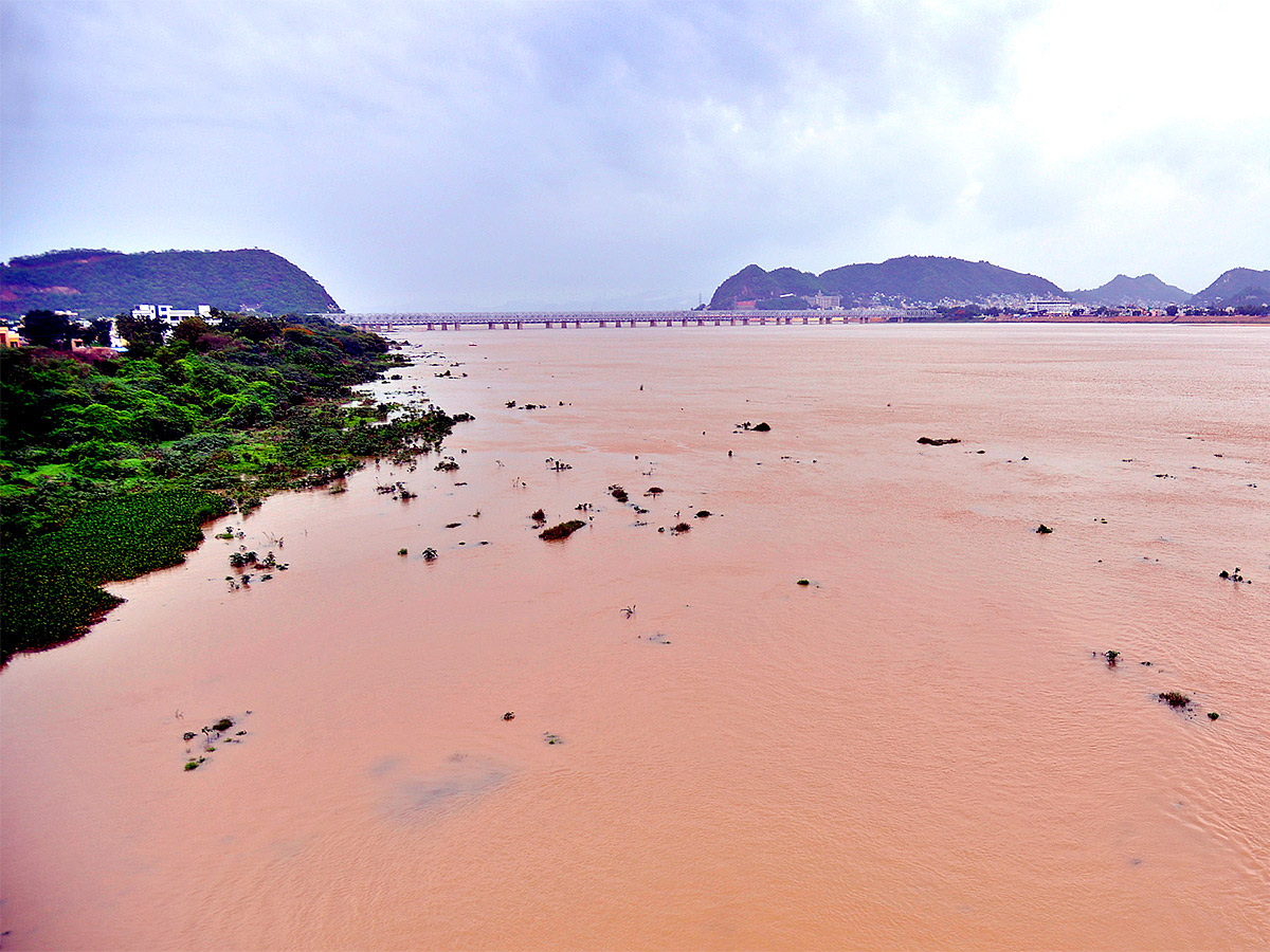 Huge Flood hit In Prakasam Barrage  - Sakshi10