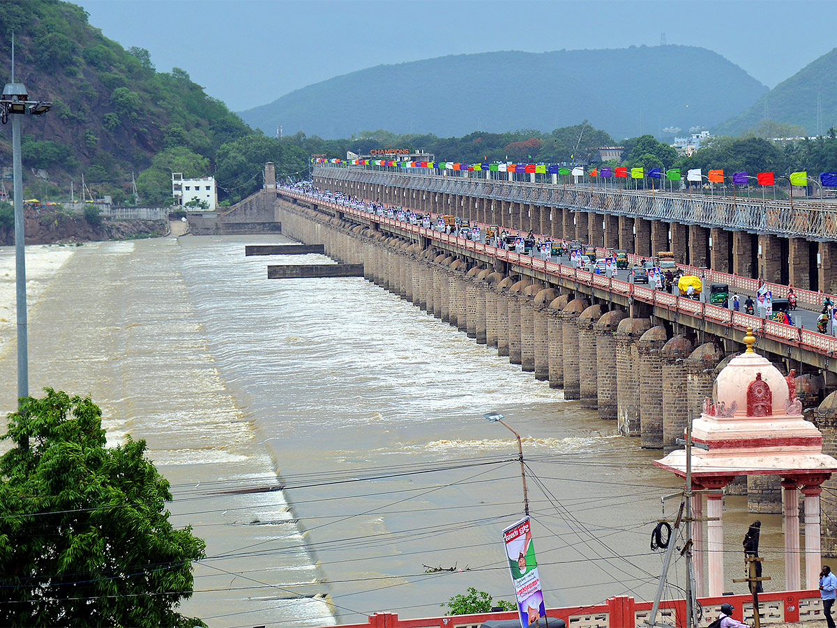 Huge Flood hit In Prakasam Barrage  - Sakshi16