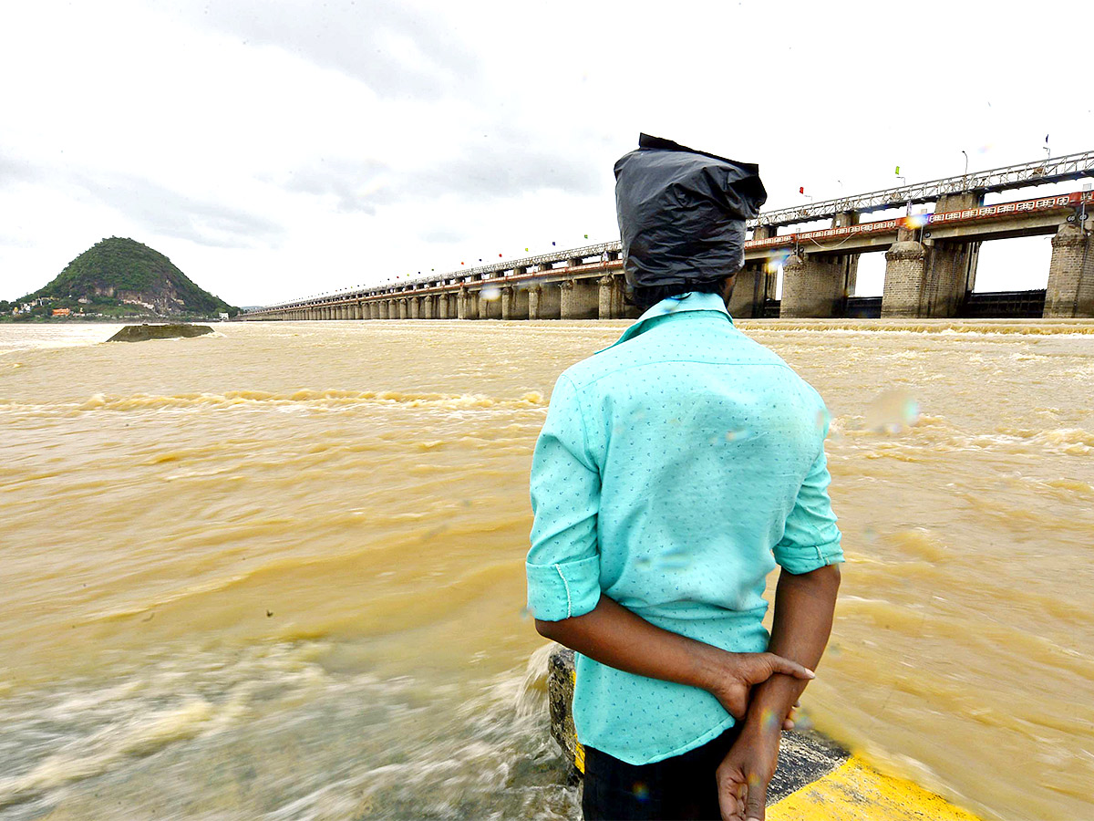 Huge Flood hit In Prakasam Barrage  - Sakshi3