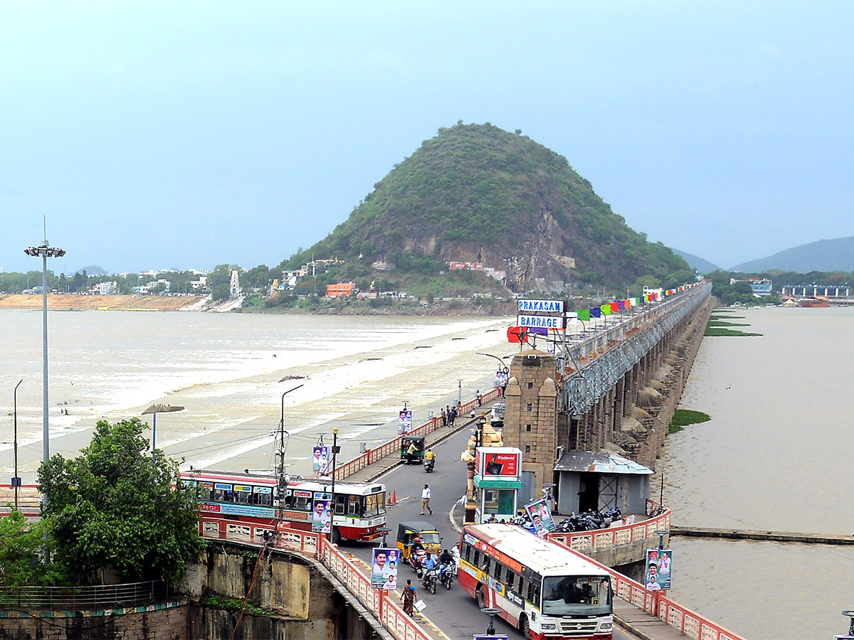 Huge Flood hit In Prakasam Barrage  - Sakshi4