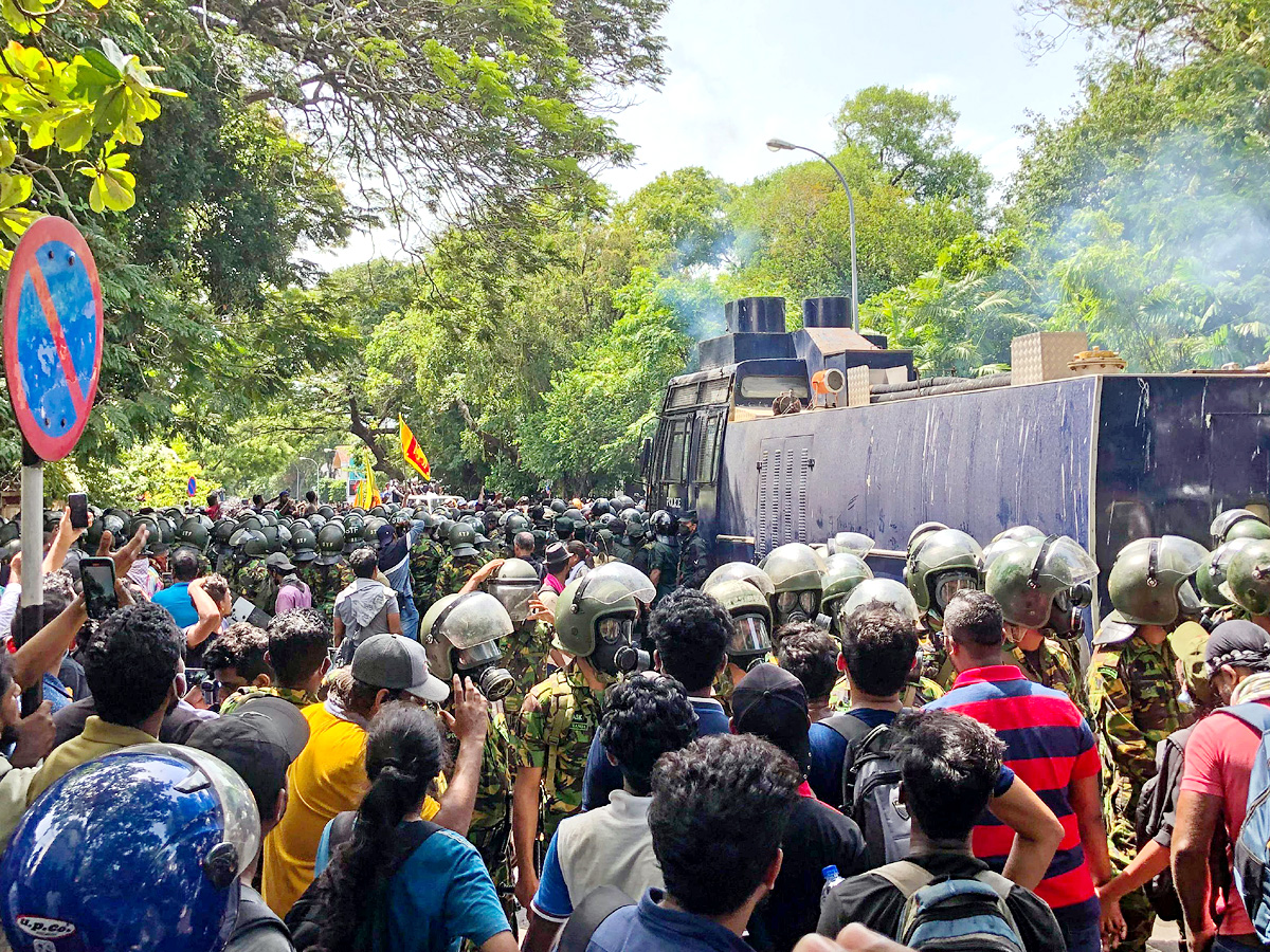 Sri Lanka crisis PM declares state of emergency as President flees Photo Gallery - Sakshi2