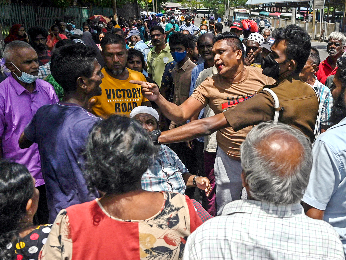 Sri Lanka crisis PM declares state of emergency as President flees Photo Gallery - Sakshi11