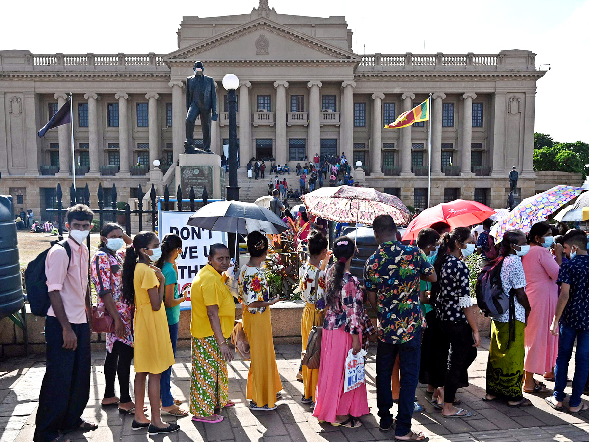 Sri Lanka crisis PM declares state of emergency as President flees Photo Gallery - Sakshi16